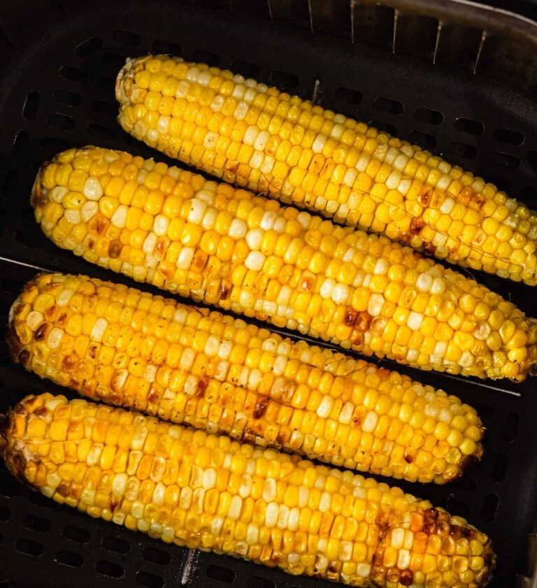 4 épis de maïs cuits dans un tiroir d'air fryer